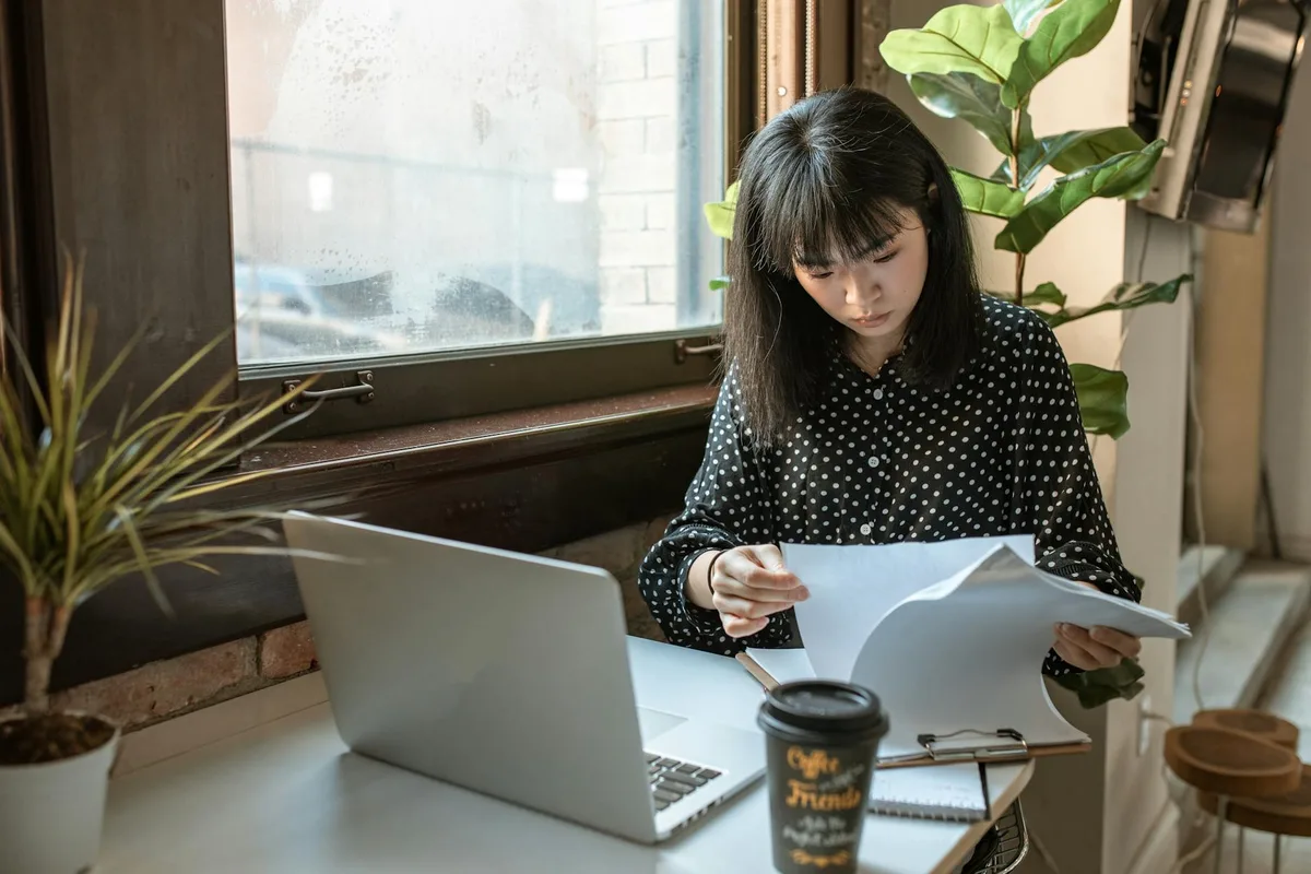 Malaysian ecommerce seller reviewing income tax obligations on a laptop