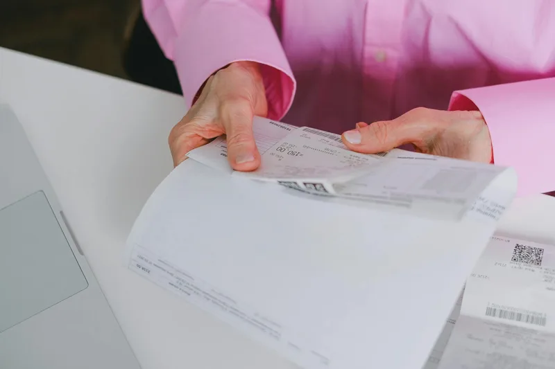 Business expense receipts, invoices, and accounting records for tax deduction